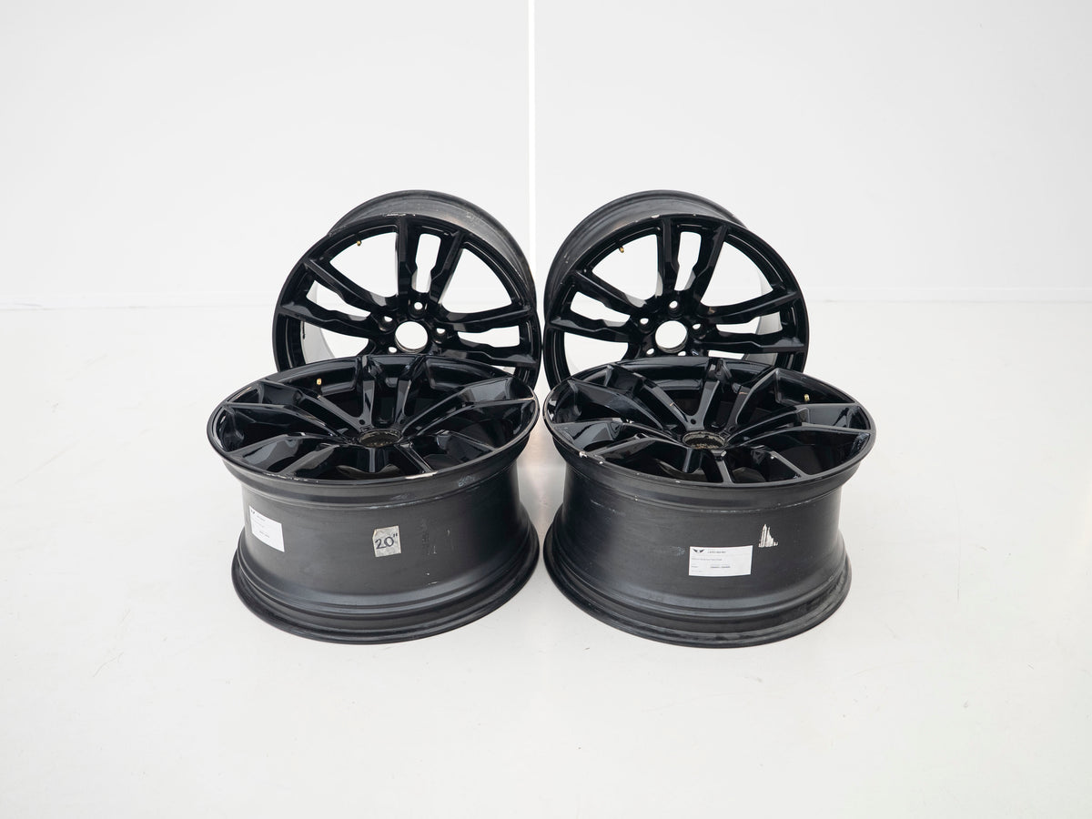 BMW 611M 20-inch four-wheel set — two front and two rear wheels, actual stock photograph