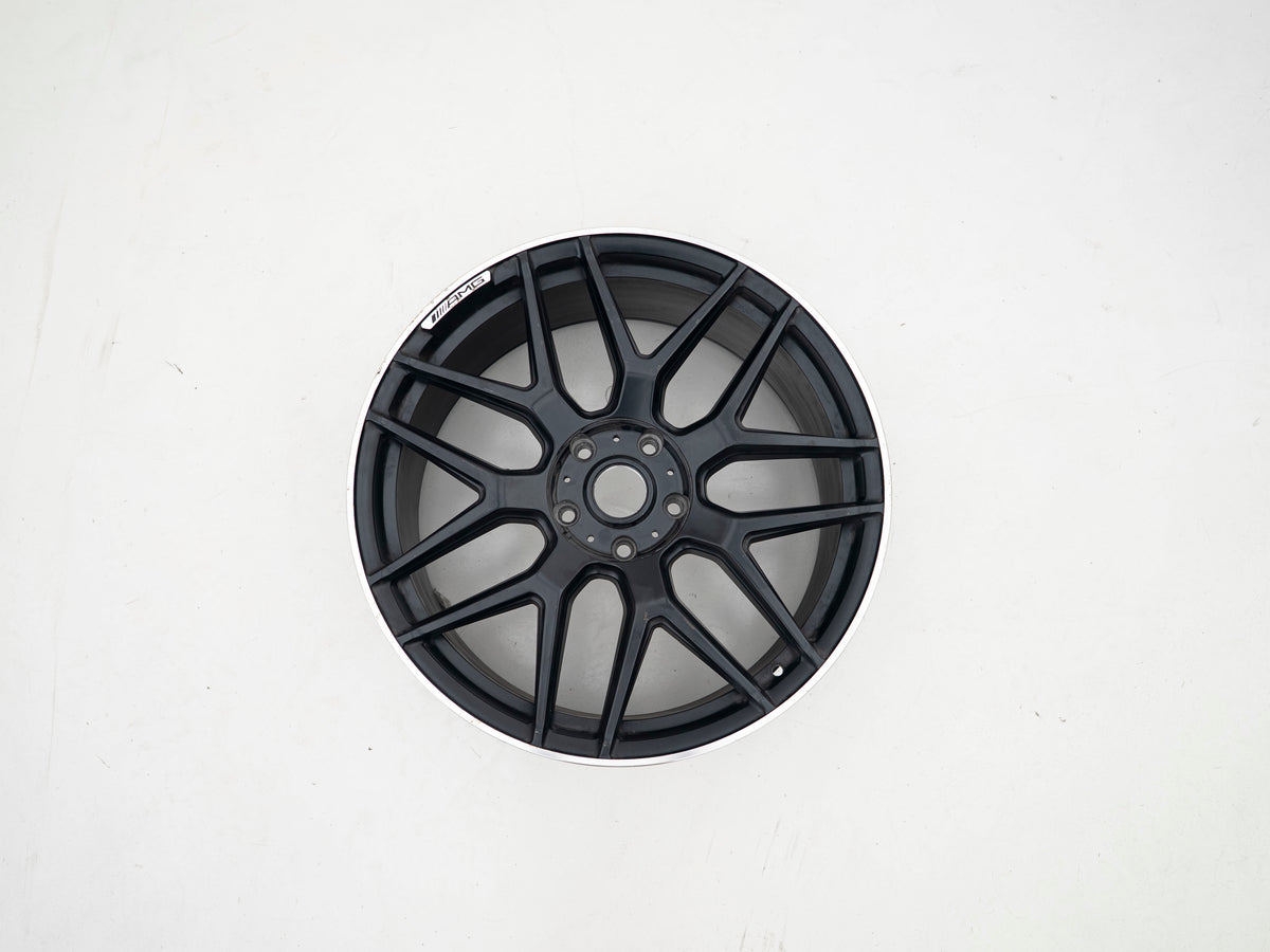 AMG 22-inch wheels, black face and silver lip — actual stock photograph