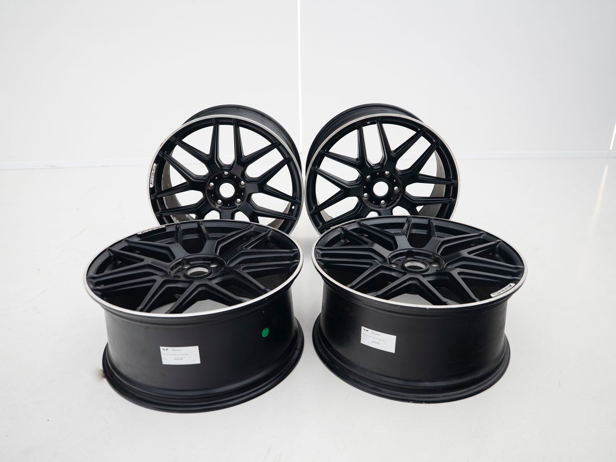 AMG 22-inch wheels, black face and silver lip — actual stock photograph