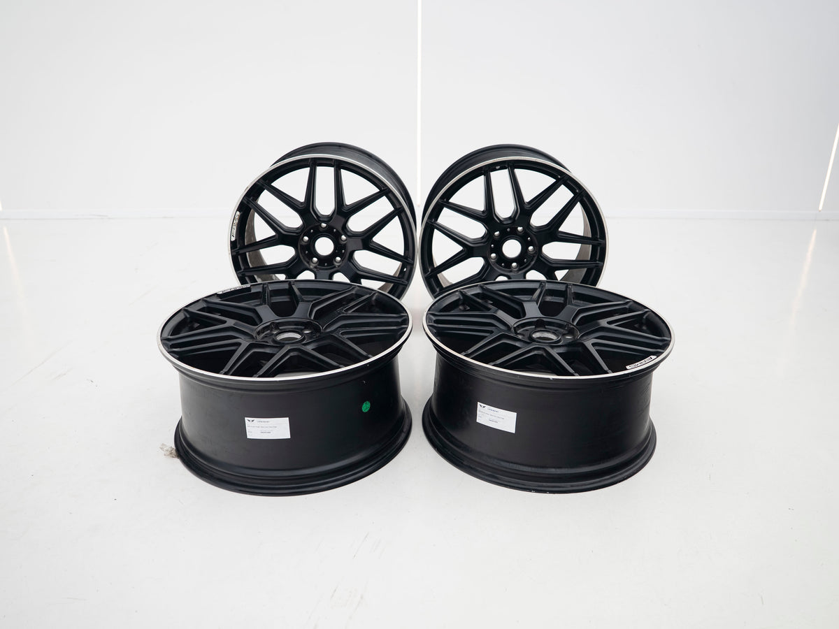 AMG 22-inch wheels, black face and silver lip — actual stock photograph