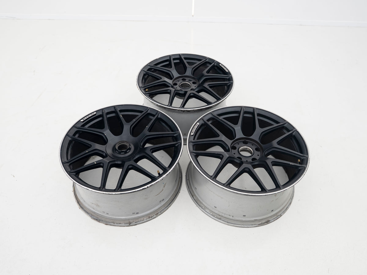 AMG 22-inch wheels, silver barrel, black face and silver lip — actual stock photograph