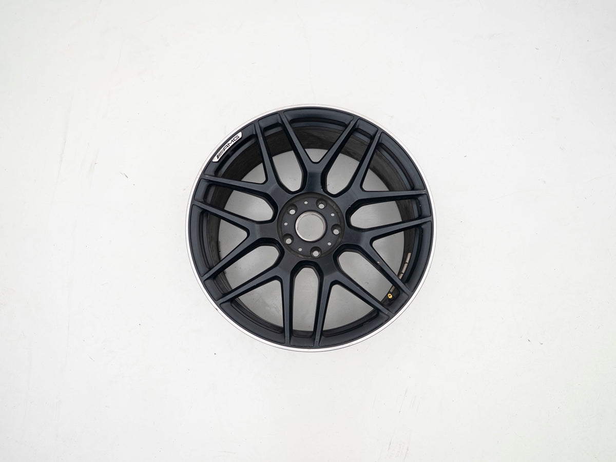 AMG 22-inch wheels, black barrel and face with silver lip — actual stock photograph