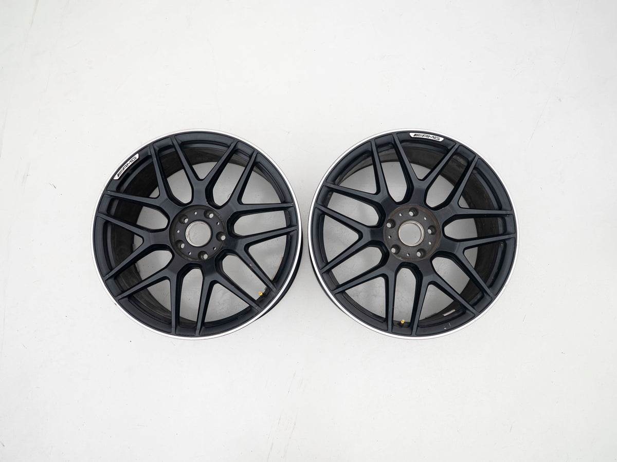 AMG 22-inch wheels, black barrel and face with silver lip — actual stock photograph