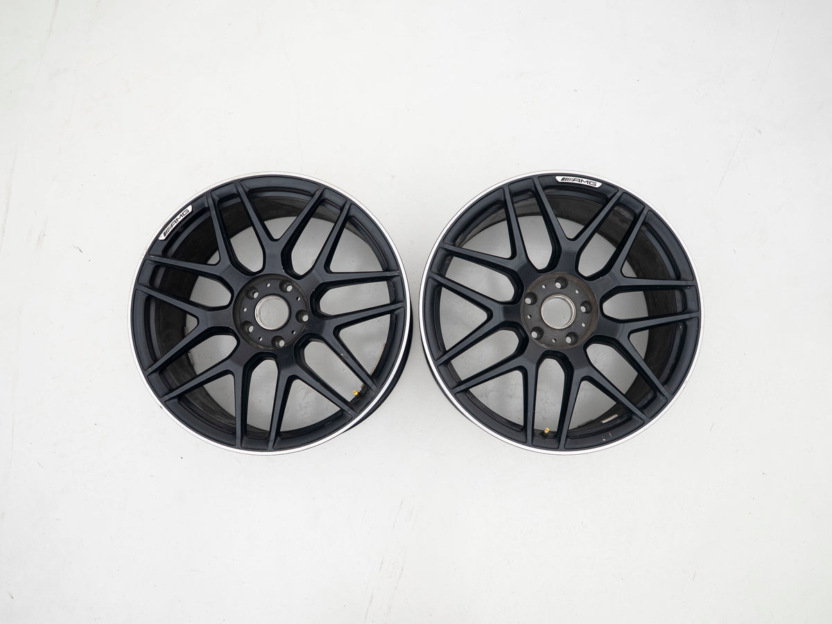 AMG 22-inch wheels, black barrel and face with silver lip — actual stock photograph
