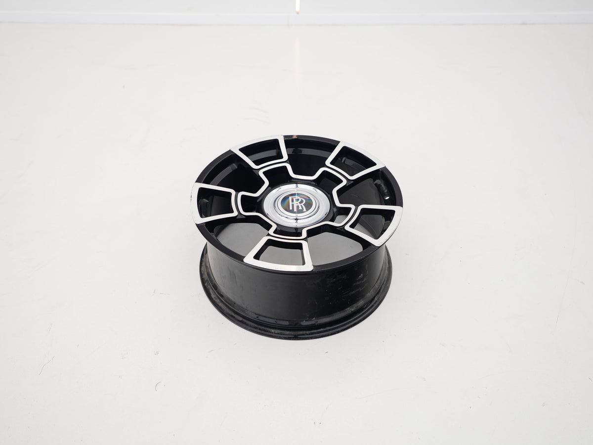 Used six-spoke black and machined wheel with RR centre cap