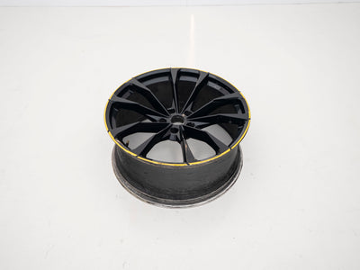 Used Lamborghini Urus 23-inch wheel with black face and yellow outer edge