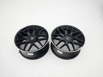 AMG 22-inch wheels, black face and silver lip — actual stock photograph
