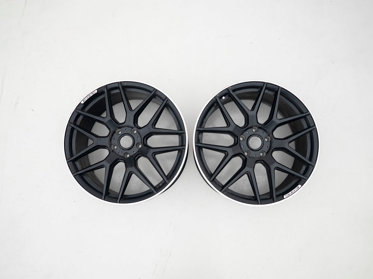 AMG 22-inch wheels, black face and silver lip — actual stock photograph