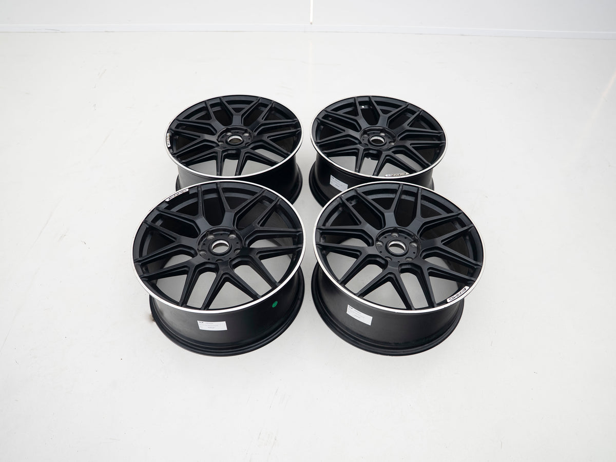 AMG 22-inch wheels, black face and silver lip — actual stock photograph