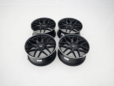 AMG 22-inch wheels, black face and silver lip — actual stock photograph