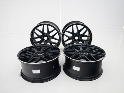 AMG 22-inch wheels, black face and silver lip — actual stock photograph
