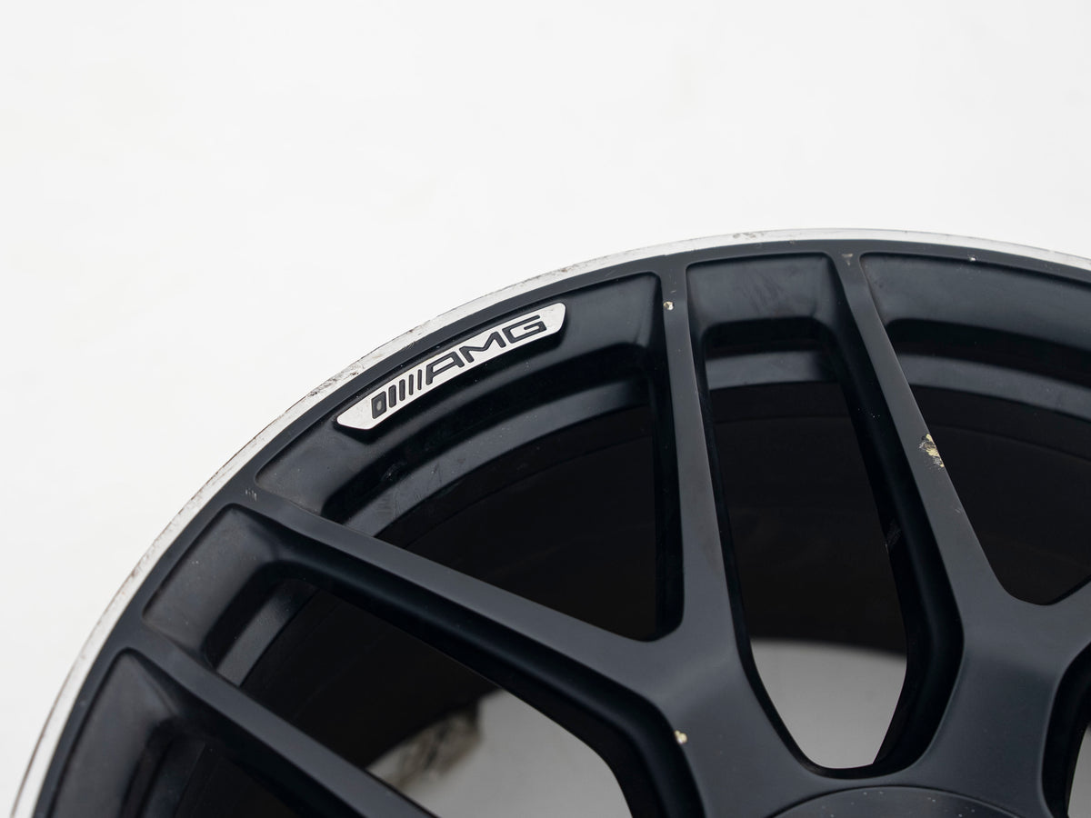 AMG 22-inch wheels, silver barrel, black face and silver lip — actual stock photograph