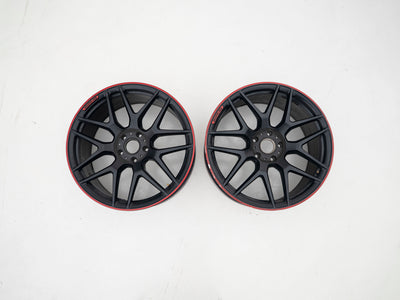 AMG 22-inch wheels, red barrel, black face and red lip — actual stock photograph