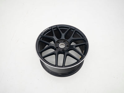 AMG 22-inch wheels, black barrel and face with silver lip — actual stock photograph