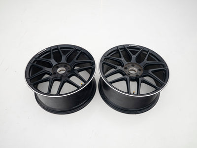 AMG 22-inch wheels, black barrel and face with silver lip — actual stock photograph