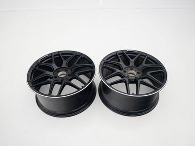 AMG 22-inch wheels, black barrel and face with silver lip — actual stock photograph