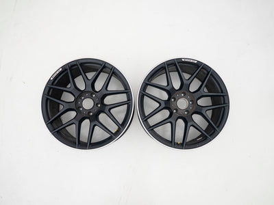 AMG 22-inch wheels, black barrel and face with silver lip — actual stock photograph