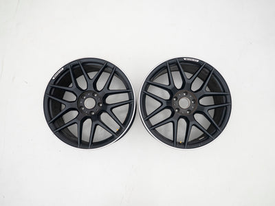 AMG 22-inch wheels, black barrel and face with silver lip — actual stock photograph