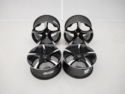 AI composite of the Ferrari SF90 four-wheel set, upright view
