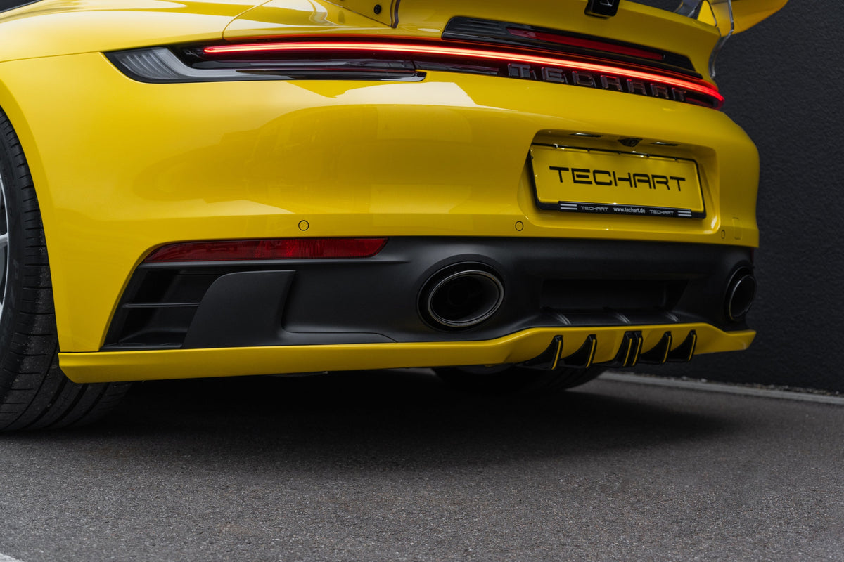 TECHART Diffuser Add-On for Rear Apron SportDesign for Porsche 911 992.1 — rear view 1