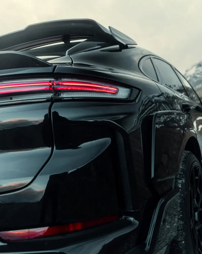 TECHART MAGNUM coupe roof spoiler detail — installed view; other conversion parts shown are not included
